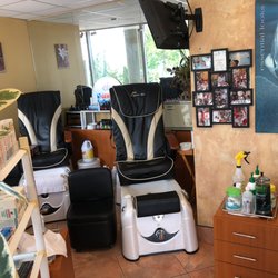 Martin's Coiffeur and Spa - Pedicure stations with the Detroit skyline.