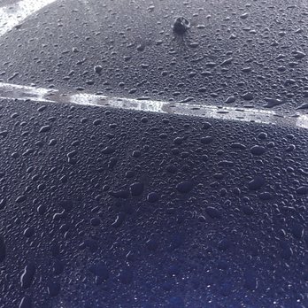 Sanctum Mobile Detailing - Water beading about a week after they waxed it - Auto Detailing Near Me