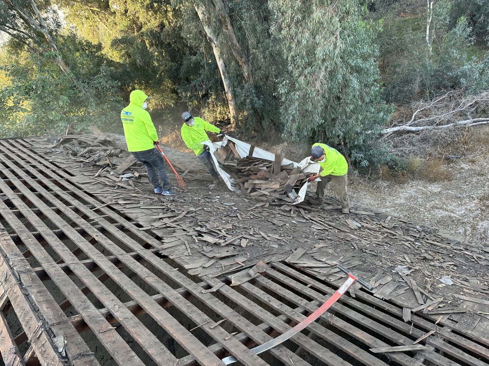 Slide of Claudex Roofing