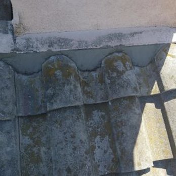 Everlasting Roofing Corp - New cement front tiles of the chimney - Roofing Near Me