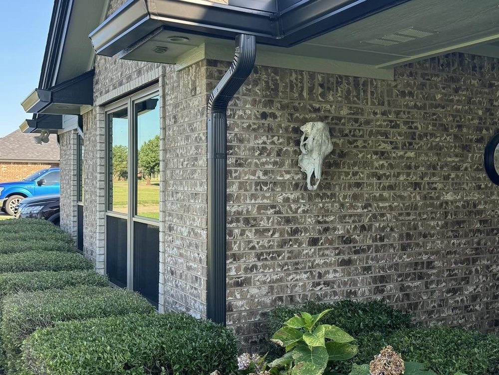 Slide of Liberty Gutters