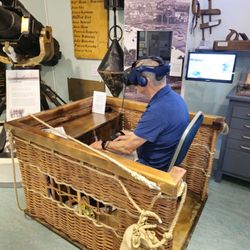 Teignmouth and Shaldon Museum - This VR activity simulates the experience of being in a WW1 spotter balloon! (That's my dad doing it.)