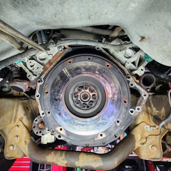 303 Auto Care - Old flywheel before machining. Clutch replacement. - Auto Repair Near Me - Denver, Colorado 303 Auto Care - Old flywheel before machining. Clutch replacement. - Auto Repair Near Me - Denver, Colorado