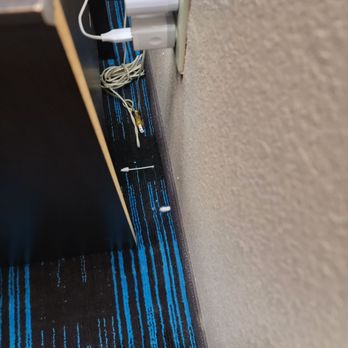 Days Inn by Wyndham Sullivan - Dirty q-tip behind bedside stand. - Hotels Near Me - Sullivan, Indiana