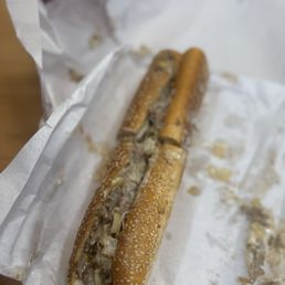 Cheesesteak with cooper and onions on house baked seeded roll Cheesesteak with cooper and onions on house baked seeded roll