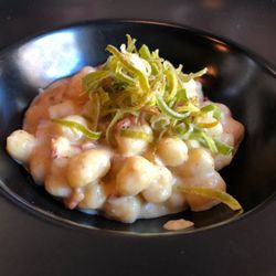 Amante - Chicche di patate con crema di porri e julienne di speck