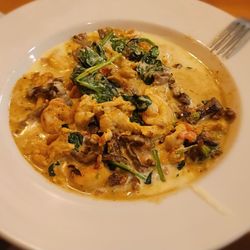 La Villa - Delicia Cancun: steak, chicken, and shrimp with spinach, Pico de gallo, and a cream sauce