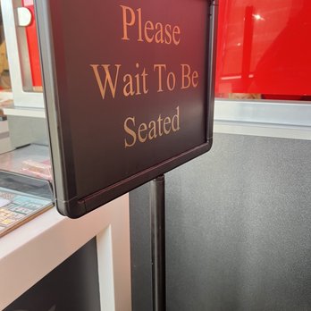 Steak 'n Shake -  sign that says please wait to be seated - Burgers Near Me - Athens, Ohio