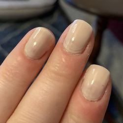 Luxury Day Spa - Terrible manicure. Rough cut cuticles and the clear top coat is visibly shorter than the rest of the polish.