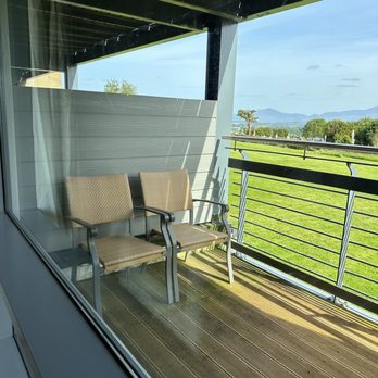 Aghadoe Heights Hotel - Deck outside our room with view of grassy lawn and cemetery - Hotels Near Me - Killarney, Kentucky