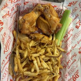 Plain chicken wings and fries Plain chicken wings and fries
