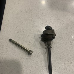 Eide Ford Lincoln - Left bolt should've been replaced with a part identical to the right.