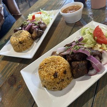 Papi's Cafe and Grill - Carne Frita with salad and yellow rice with pigeon peas as well as a side of beans. - Puerto Rican Near Me - Fort Walton Beach, Florida Papi's Cafe and Grill - Carne Frita with salad and yellow rice with pigeon peas as well as a side of beans. - Puerto Rican Near Me - Fort Walton Beach, Florida