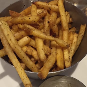 Earls Kitchen + Bar - Truffle fries with aioli sauce. So freaking good. - New American Near Me - McLean, Virginia Earls Kitchen + Bar - Truffle fries with aioli sauce. So freaking good. - New American Near Me - McLean, Virginia