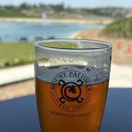 Beer with lake in background