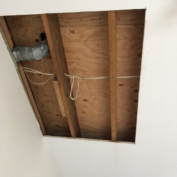 Metropolitan Plastering & Painting - Had servepro remove some water damage in the ceiling which left a large hole - Drywall Installation & Repair Near Me