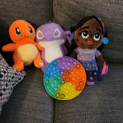 Claw Daddy Arcades - Charmander, Stitch, and my 2 free gifts