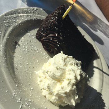 Moss Beach Distillery - Moist chocolate cake with fresh made whipped cream! - Seafood Near Me - Moss Beach, California