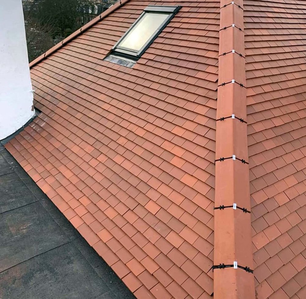 Slide of Quail Hill Roofing