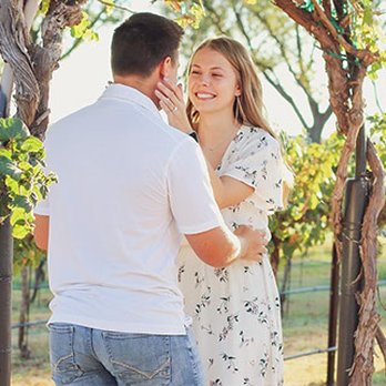 La Vie Estate - a man and a woman in a vineyard - Wineries Near Me - Blanco, Texas La Vie Estate - a man and a woman in a vineyard - Wineries Near Me - Blanco, Texas