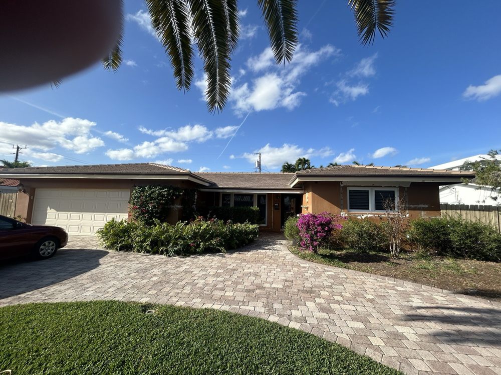 Slide of The Roof Xperts