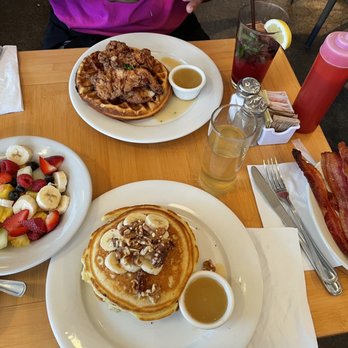 Clinton St. Baking - Banana/walnut Pancakes, Sugar Cured Bacon, Chicken & Waffles, side of Fresh fruit, blueberry lemonade - Bakeries Near Me - New York, New York Clinton St. Baking - Banana/walnut Pancakes, Sugar Cured Bacon, Chicken & Waffles, side of Fresh fruit, blueberry lemonade - Bakeries Near Me - New York, New York