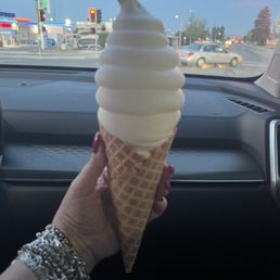 Vanilla ice cream in a waffle cone.