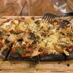 High Grounds Cafe - Four mushroom pizza