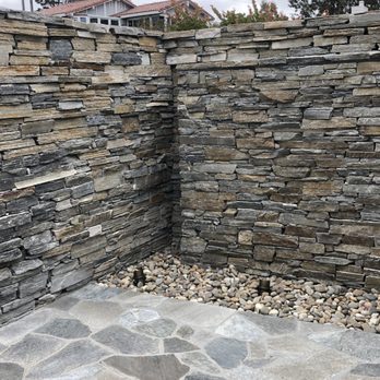 Newland Landscape - After - Stack Stone Water Wall - Landscaping Near Me