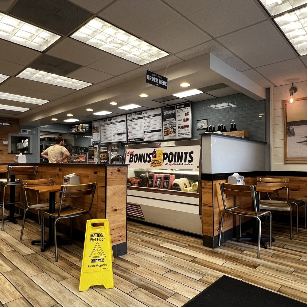 Jersey Mike's Subs - View of the dining area and sandwich prep counter. - Sandwiches Near Me - Atlanta, Georgia