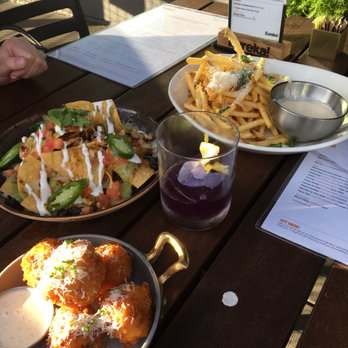 Eureka! - Mac n cheese bites (had a slight kick), chicken nachos (fresh but hot jalapeños which I loved), and fries - American Near Me - Las Vegas, Nevada Eureka! - Mac n cheese bites (had a slight kick), chicken nachos (fresh but hot jalapeños which I loved), and fries - American Near Me - Las Vegas, Nevada
