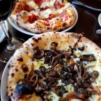 Mioposto - Peperoni and mushroom pizzas. - Pizza Near Me - Mercer Island, Washington Mioposto - Peperoni and mushroom pizzas. - Pizza Near Me - Mercer Island, Washington