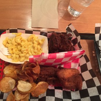 Roost Chicken & Biscuits - 1/2 chicken. Original and Nashville hot (darker looking chicken on top right) with Mac and cheese and chips! Enjoy! - Southern Near Me - Chicago, Illinois