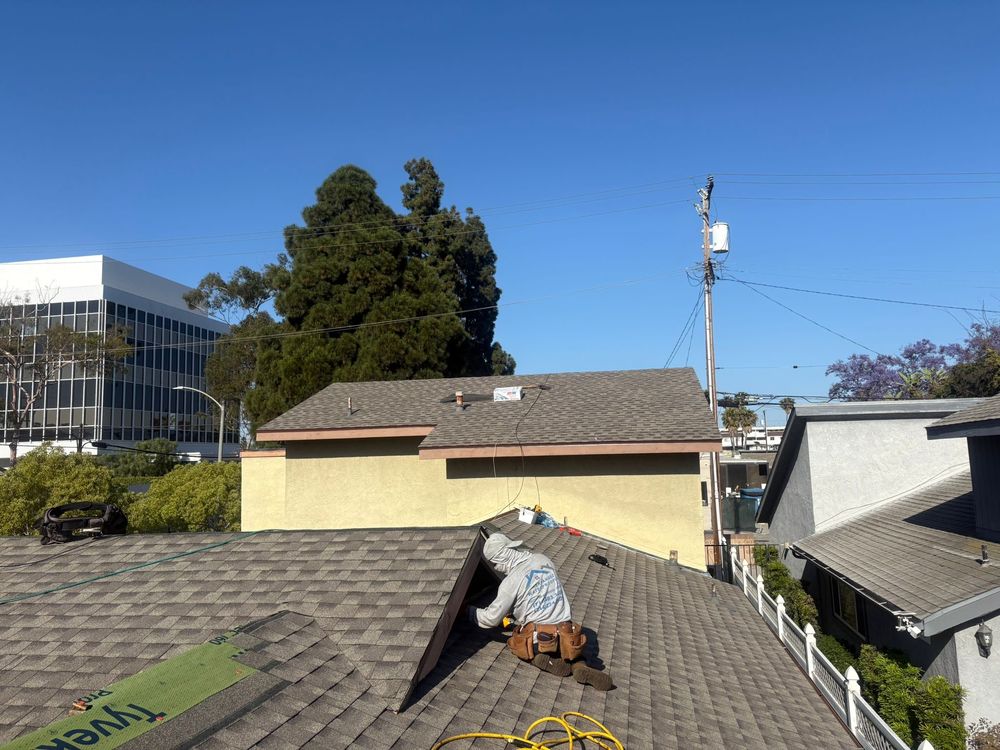 Slide of Aguilar Roofin Repair