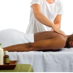 Holistic Healing & Nutrition - AromaTouch - Essential oil application applied to the back and the feet to create a feeling of overall wellness