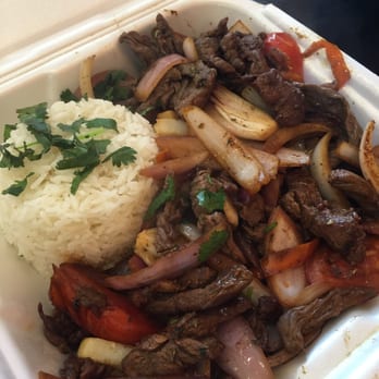 Peru's Chicken - Lomo Saltado, steak with onions and tomatoes served over french fries and rice. - Peruvian Near Me - Mitchellville, Maryland