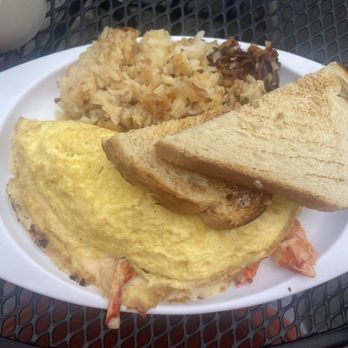 The Greenery Cafe - Lobster and Brie omelette with sourdough toast and hash browns - Breakfast & Brunch Near Me - Ogunquit, Maine