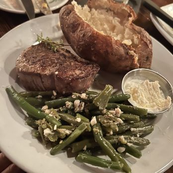The Local on 17 - Petite Filet with baked potato and string beans with garlic. Very good!! - Steakhouses Near Me - Richmond Hill, Georgia