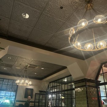 The Gage - We like the decorative ceiling aside from the dripping on our table - New American Near Me - Chicago, Illinois