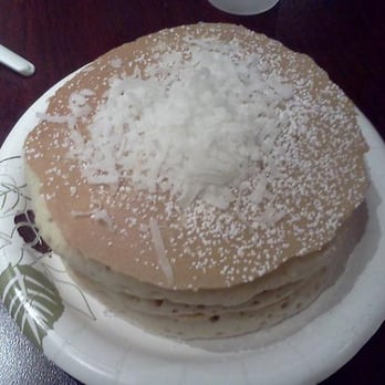 Eggs 'n Things - My coconut pancakes! Delicious! Coconut on top and throughout pancakes :D - Breakfast & Brunch Near Me - Honolulu, Hawaii
