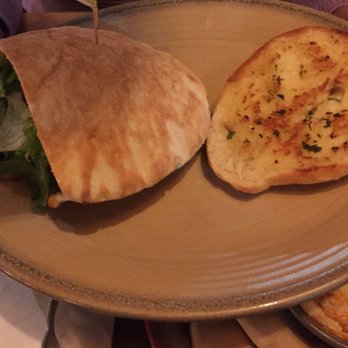 Nando's Peri-Peri - Mango and lime chicken pita w/ garlic bread - South African Near Me - Reston, Virginia Nando's Peri-Peri - Mango and lime chicken pita w/ garlic bread - South African Near Me - Reston, Virginia