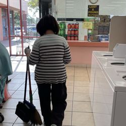 Lee's Laundromat - This lady verbally force me to use two machines to wash my small load of clothes.