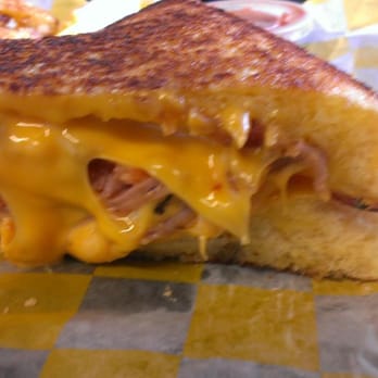 The Cheesie's Truck - The Classic
Cheddar cheese, American cheese, tomatoes, ham and bacon on Texas toast. - Food Trucks Near Me