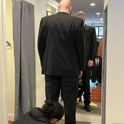 Keezer's & Le Couturier - Husband getting fitted and measured for his tux.