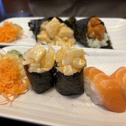 Mojo Thai & E-San - Back. - Spicy Scallop Hand Roll, Spicy Salmon Hand Roll, Front Spicy Scallop Nigiri Sushi, Salmon Nigiri Sushi.