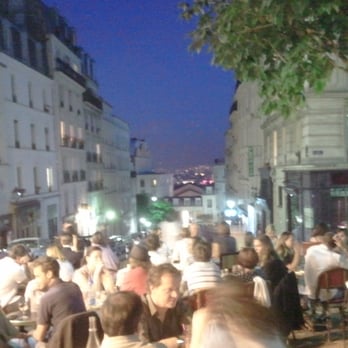 Le Relais de la Butte - View of the city lights at night. The Sacre Couer is behind me, after you climb a steep flight of stairs - French Near Me - Paris, 75 Le Relais de la Butte - View of the city lights at night. The Sacre Couer is behind me, after you climb a steep flight of stairs - French Near Me - Paris, 75