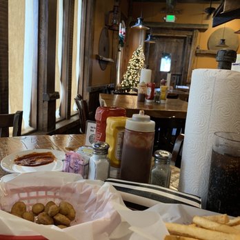 Griff's BBQ & Grill - The inside from our table looking towards the giant beautiful entry door. - American Near Me - Copperopolis, California