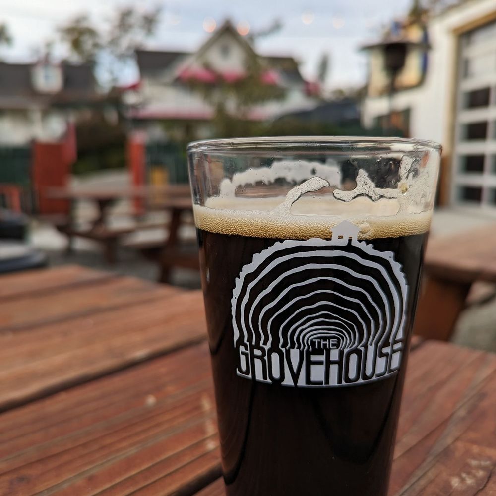 The Grove House - a pint of beer on a wooden table - Beer Bar Near Me - Mariposa, California The Grove House - a pint of beer on a wooden table - Beer Bar Near Me - Mariposa, California