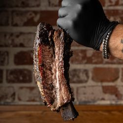 Bludso's BBQ - Dinosaur Beef Rib. Smoked low & slow for 8 hours