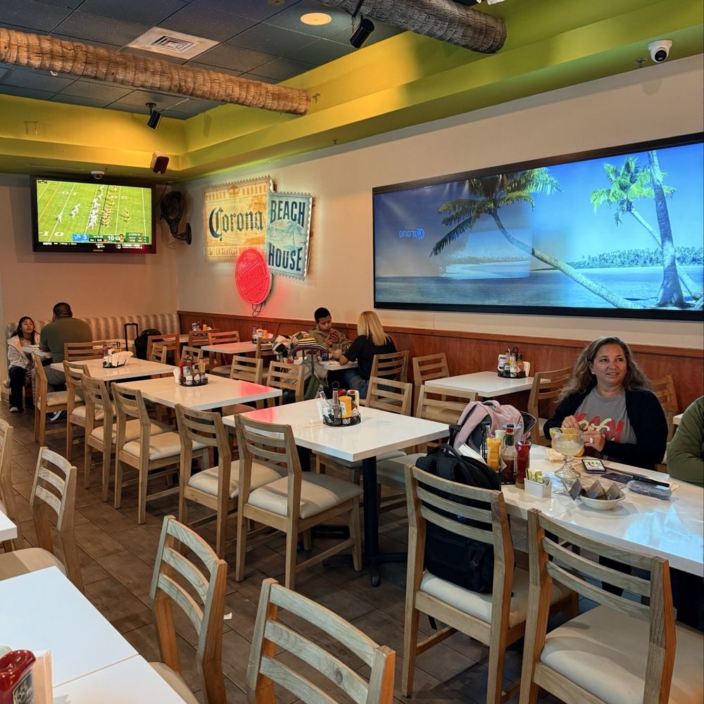 Corona Beach House - Restaurant sitting space. Super casual and friendly. If you hit it while your favorite team is playing a match then you hit the jackpot. - American Near Me - Miami, Florida